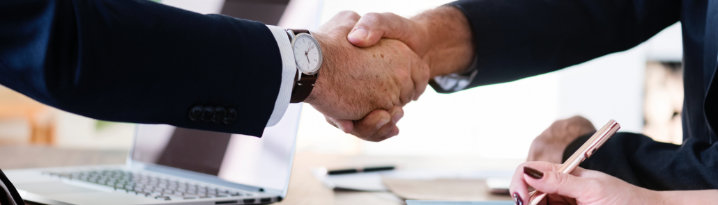 business men shaking hands at mark Kennedy accountants